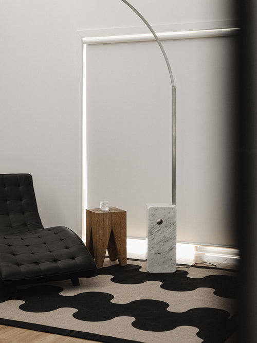 Aligned black new jute rug