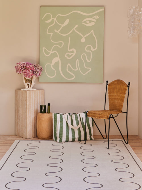 Aligned bone chenille rug