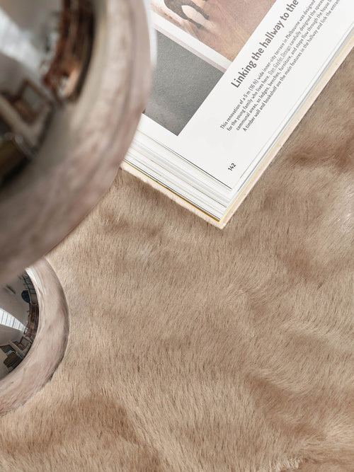 Rowan light tan vegan silk rug