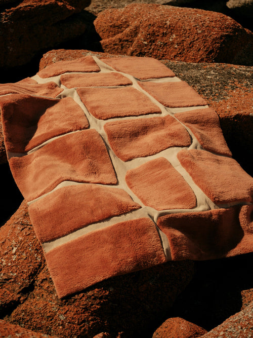 Ember rust washable wool fine cut pile rug