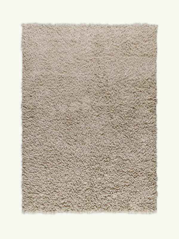 Poncho bone shag rug